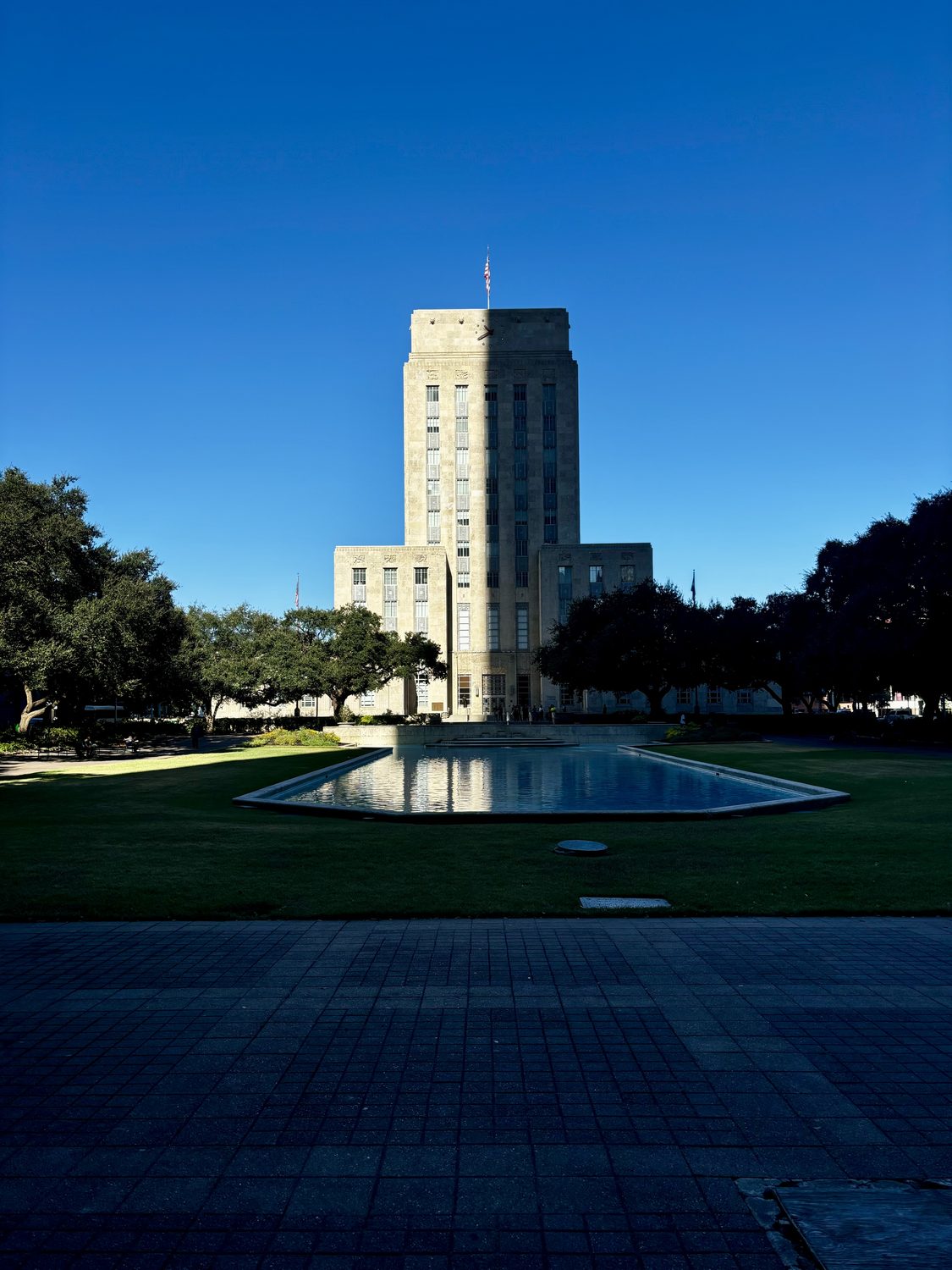 City hall tower and reflecting pool